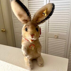 Steiff Rabbit " Manni " with tag, ribbon + button